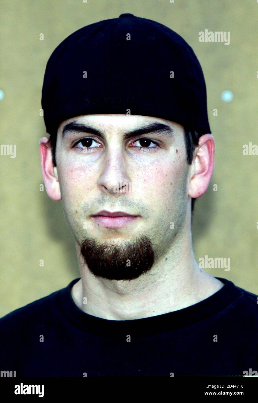 Linkin Park drummer Rob Bourdon poses after a news conference at the Boost  Mobile Pro of Skateboarding contest at the Hard Rock Hotel & Casino in Las  Vegas, Nevada, June 27, 2003.