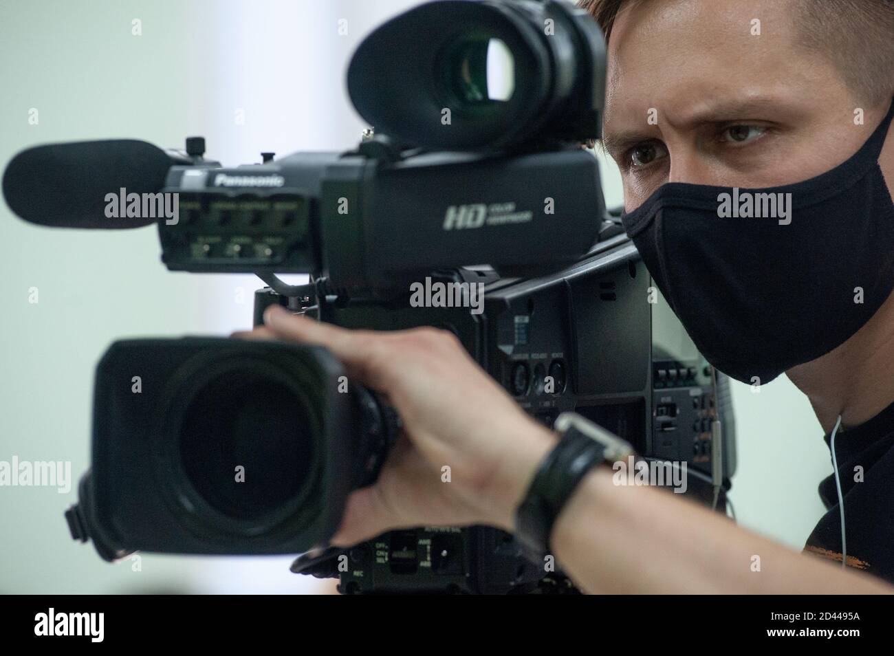 Tambov, Russia. 08th Oct, 2020. Journalist of the Tambov regional TV company wearing a face mask shoots a report in the administration of the Tambov region. Credit: SOPA Images Limited/Alamy Live News Stock Photo