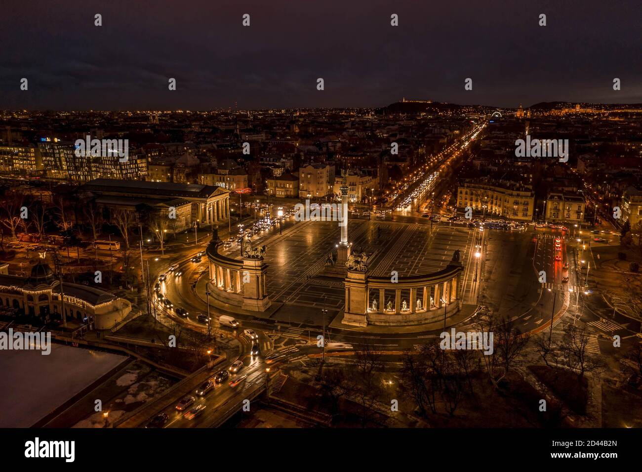 Aerial drone shot of Heroes Square in the night in Budapest winter with ...