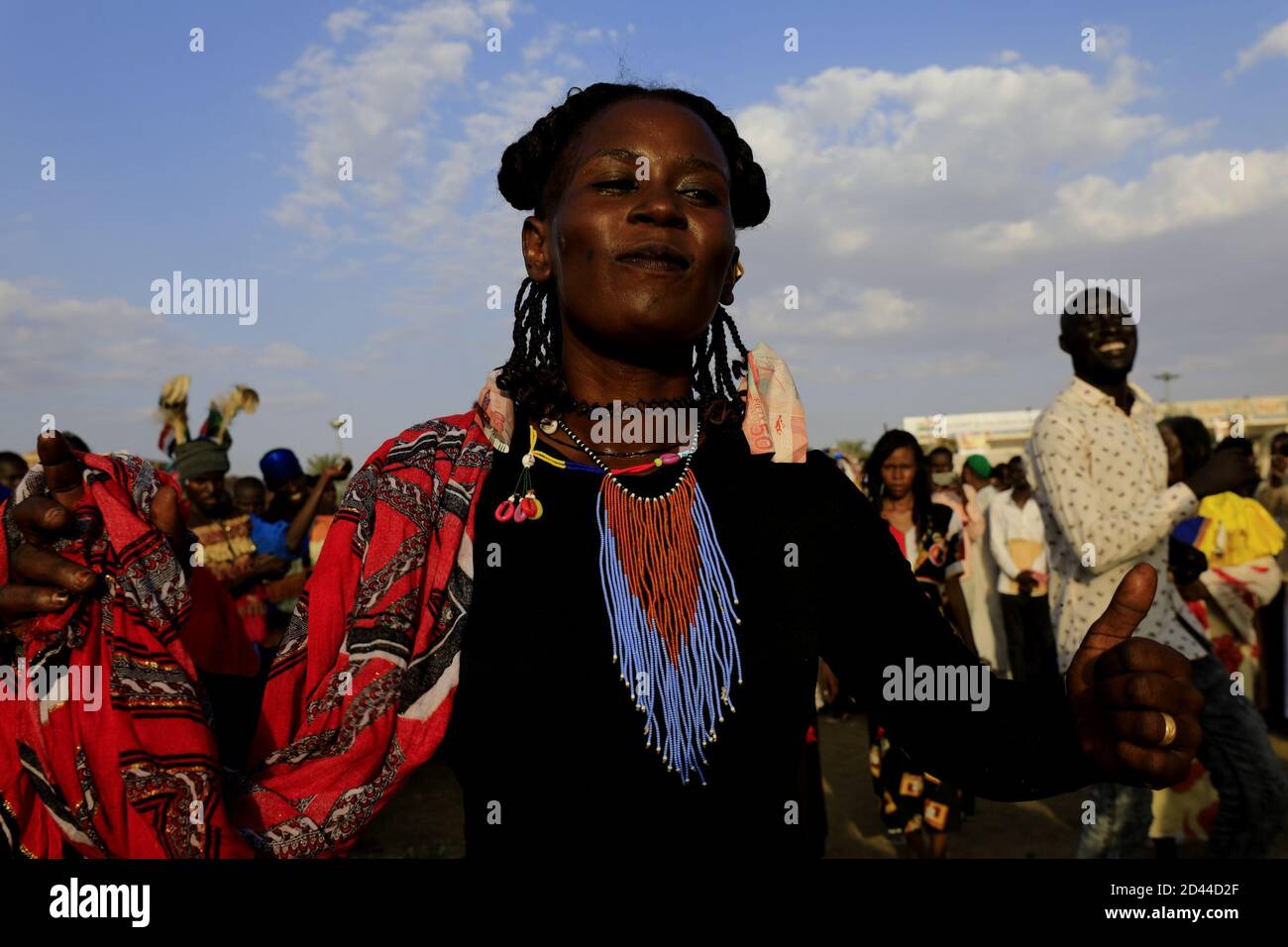 Khartoum, Khartoum. 8th Oct, 2020. Sudanese attend a celebration ceremony upon the arrival of representatives of Sudanese government and armed groups who signed a final peace deal in Juba to end their armed conflicts, in Khartoum, Sudan on Oct. 8, 2020. Credit: Mohamed Khidir/Xinhua/Alamy Live News Stock Photo