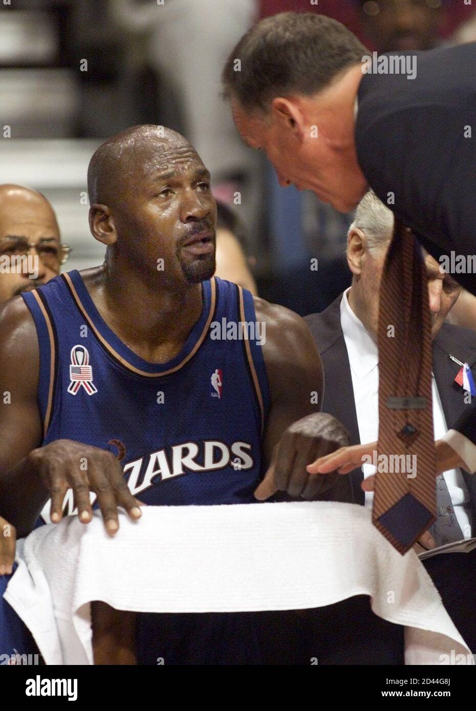 Washington Wizards Guard Michael Jordan L Talks To Wizards Head Coach Doug Collins During Pre Season Nba Action Against The Detroit Pistons In Auburn Hills October 11 2001 This Is Jordan S First Game