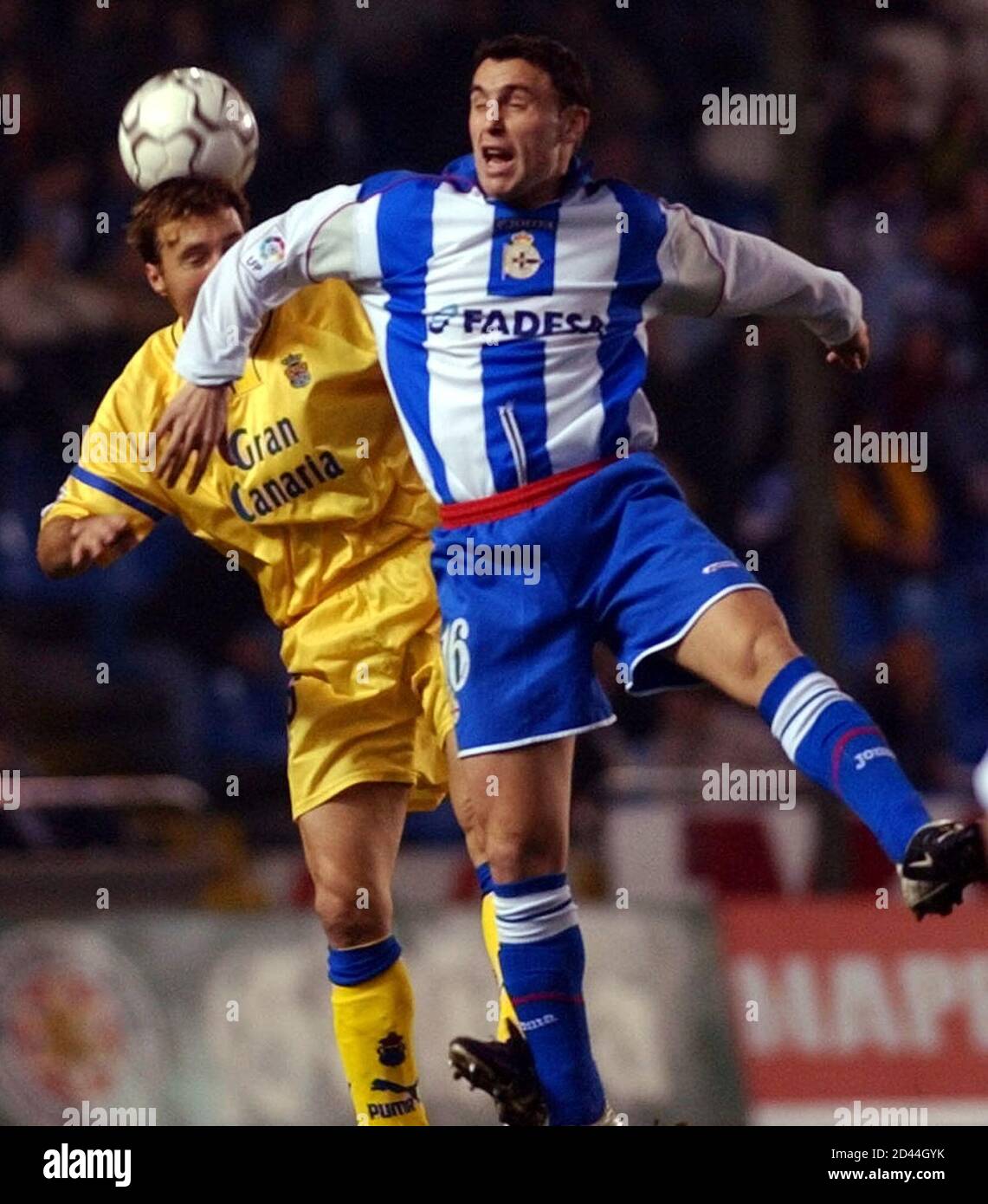 Deportivo Coruna's Sergio Gonzalez Soriano (R) and Las Palmas' Josico  Moreno Verdu jump for the ball during their First Division soccer match at La  Coruna's Riazor stadium January 20, 2002. REUTERS/Miguel Vidal