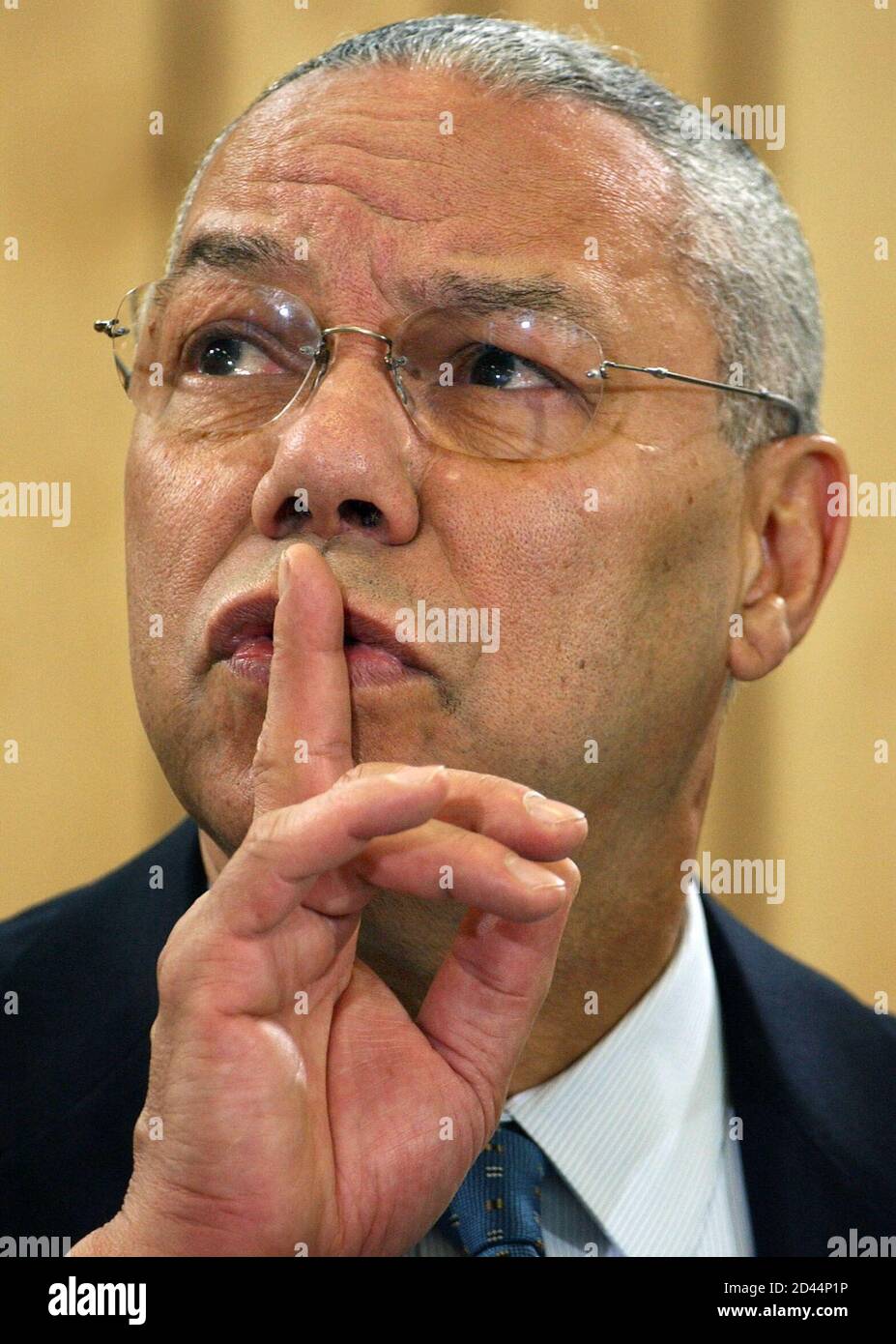 U.S. Secretary of State Colin Powell gestures during a discussion with pupils at the Max-Planck high school in Berlin April 1, 2004. Powell is attending a conference of international donors for Afghanistan in Berlin. REUTERS/Stephanie Pilick/Pool  AKW/JV Stock Photo