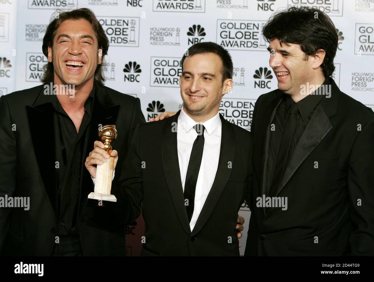 Actor Javier Bardem (L), director Alejandro Amenabar (C) and producer Fernando Bovaira pose with their award won for best foreign language film for their work in  'The Sea Inside,' ('Mar adentro') at the 62nd annual Golden Globe Awards at the Beverly Hilton in Beverly Hills, California January 16, 2005. Stock Photo