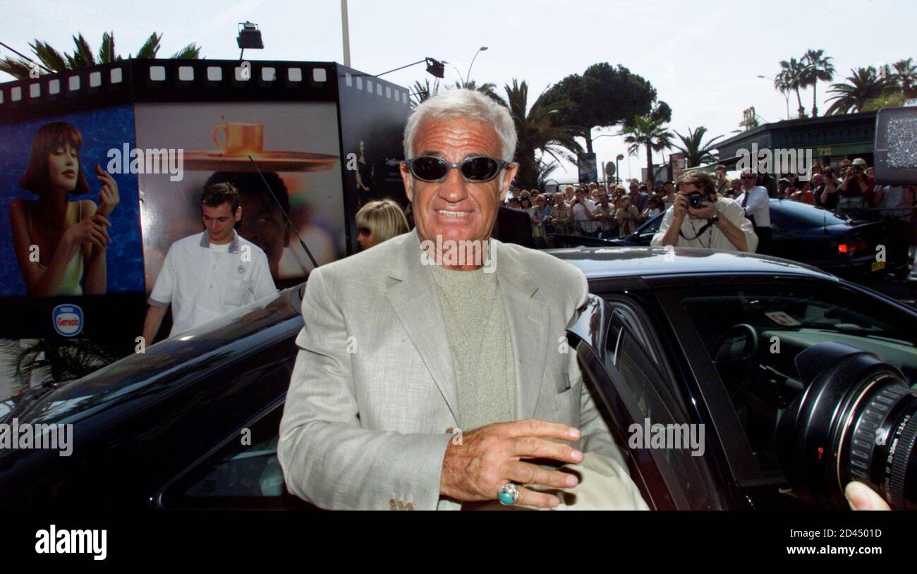 French actor Jean-Paul Belmondo leaves his car as he arrives at a hotel in  Cannes May 14, 2001. Belmondo attended the 54th International Cannes Film  Festival for a hommage to French director