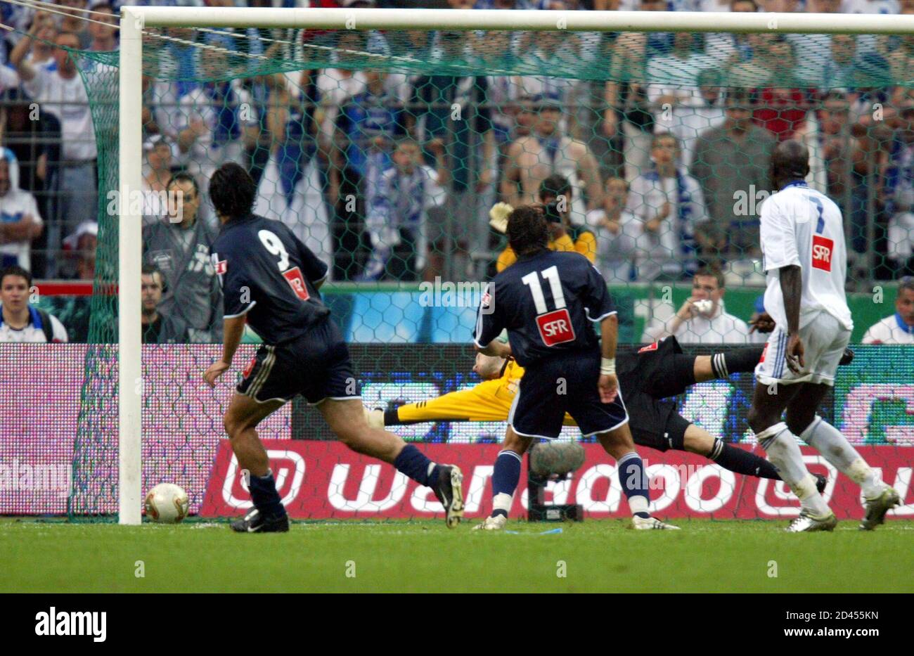 Hugo Ribeiro Leal Of Psg L Scores The First Goal For His Team As Team Mate Fabrice Fiorese R Looks On And Auxerre S Goalkeeper Fabien Cool Fails To Makes A Save In Their