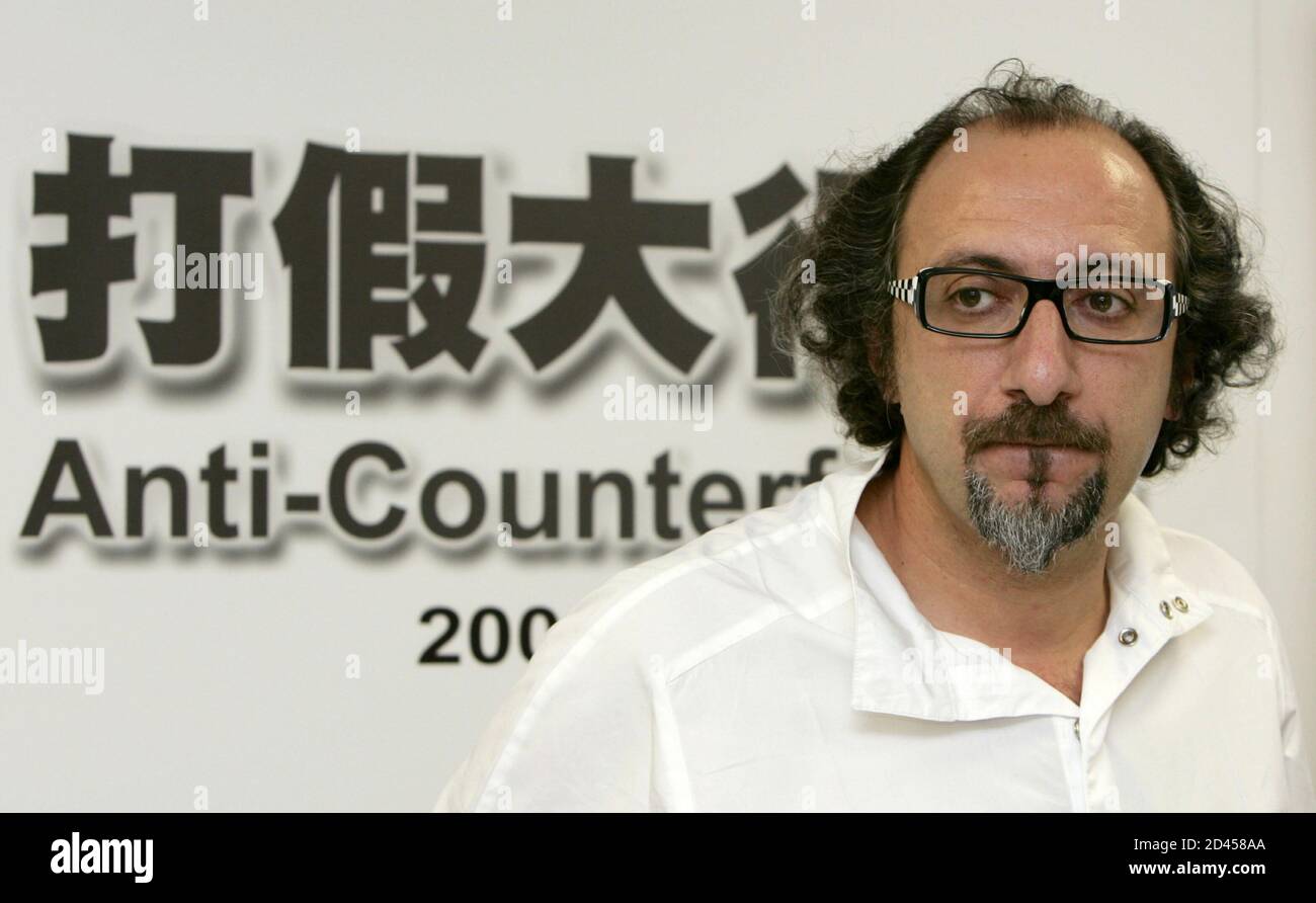 French eyewear designer Alain Mikli attends a news conference on anti-counterfeiting in Hong Kong July 12, 2004. Mikli intends to liaise and cooperate with governments and industry-related organisations to stop such counter-feiting. The 'alain mikli' brand has an annual sales close to 40 million euros ($49 million) and 450,000 eyewears are sold per year. Stock Photo