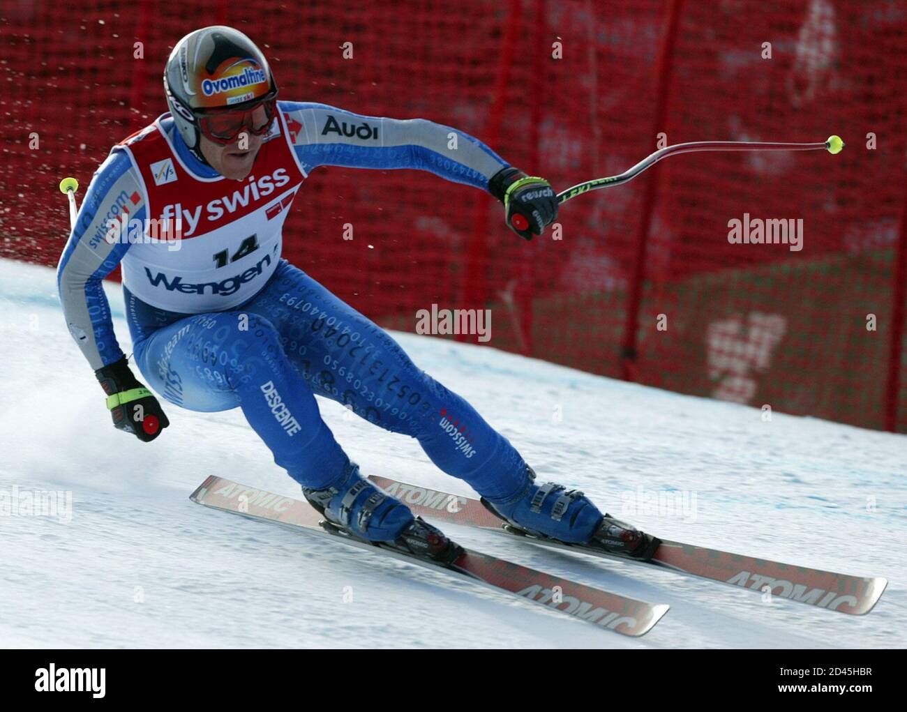 DIDIER CUCHE OF SWITZERLAND TAKES A CURVE DURING DOWNHILL TRAINING RUN ON  THE LAUBERHORN WORLD CUP COURSE IN WENGEN Stock Photo - Alamy