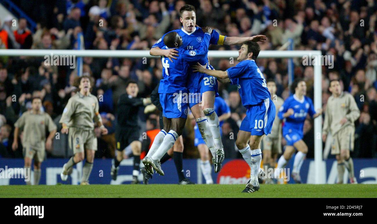 Chelsea S John Terry C Celebrates Scoring Against Barcelona With Joe Cole Centre R And Claude Makelele Centre L During Their Champions League First Knockout Round Second Leg Match At Stamford Bridge London