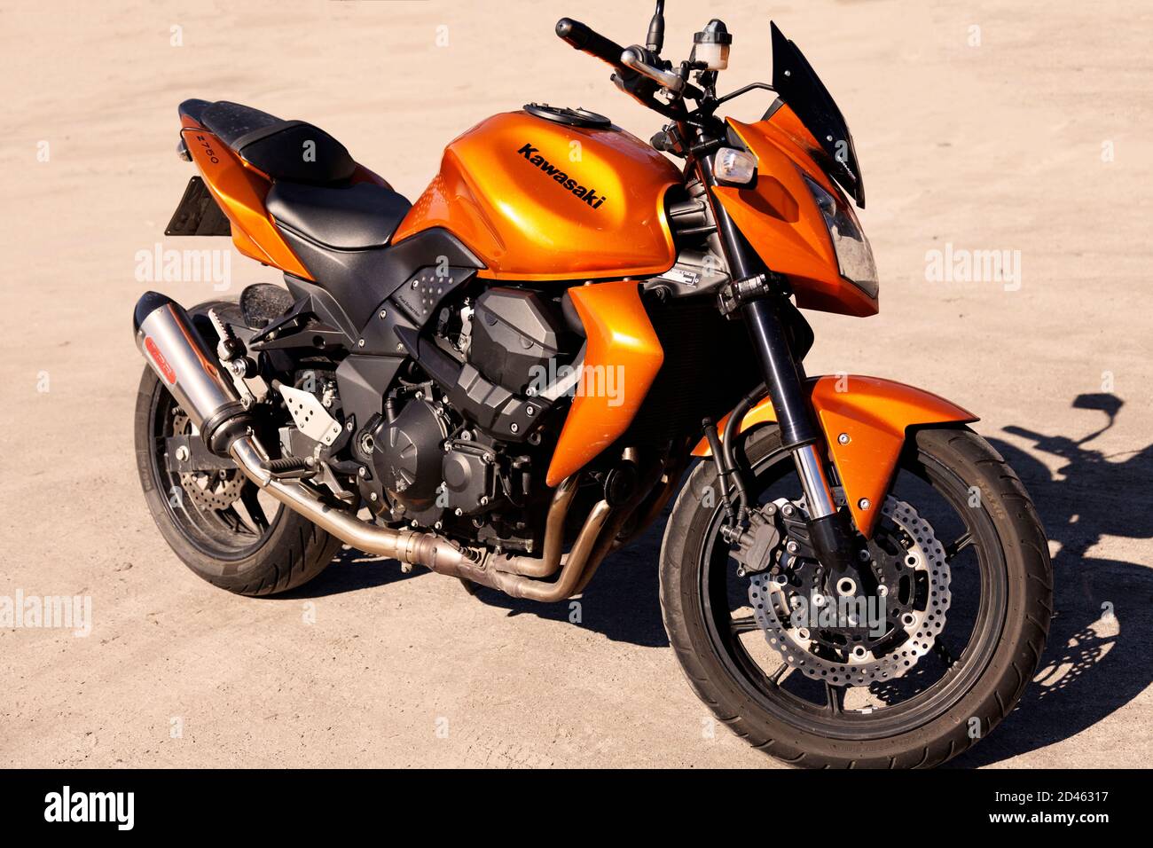 Umea, Norrland Sweden - April 14, 2020: modern orange motorcycle in the desert Stock Photo