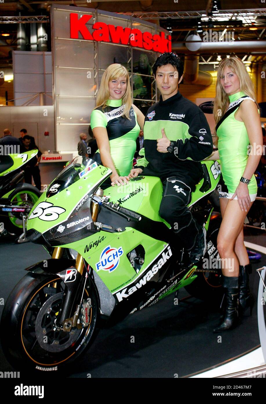 Kawasaki rider Japan's Shinya Nakano poses for photographs the ZX-RR during the International Motorcycle and Scooter Show in Birmingham, central England, 2004. REUTERS/Darren Staples DS/ASA/WS Stock Photo - Alamy