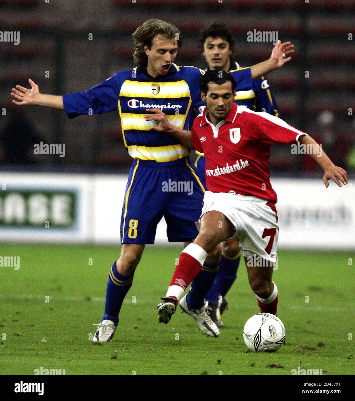 Parma S Budel Duels For The Ball With Standard Liege S Conceicao During A Uefa Cup Soccer Match In Liege Parma S Alessandro Budel L Duels For The Ball With Standard Liege S Sergio Conceicao