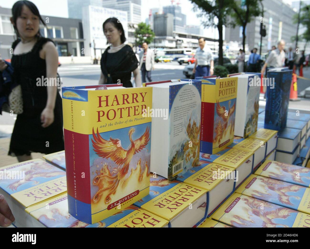 A Pedestrian Looks At Stacks Of J K Rowling S Harry Potter And The Order Of The Phoenix Books In Front Of A Bookstore In Tokyo June 21 03 After Three Long Years Of A Pedestrian Looks At Stacks Of J K Rowling S Harry Potter And The Order Of The Phoenix Books In Front Of A Bookstore In Tokyo June 21 03 After Three Long Years Of