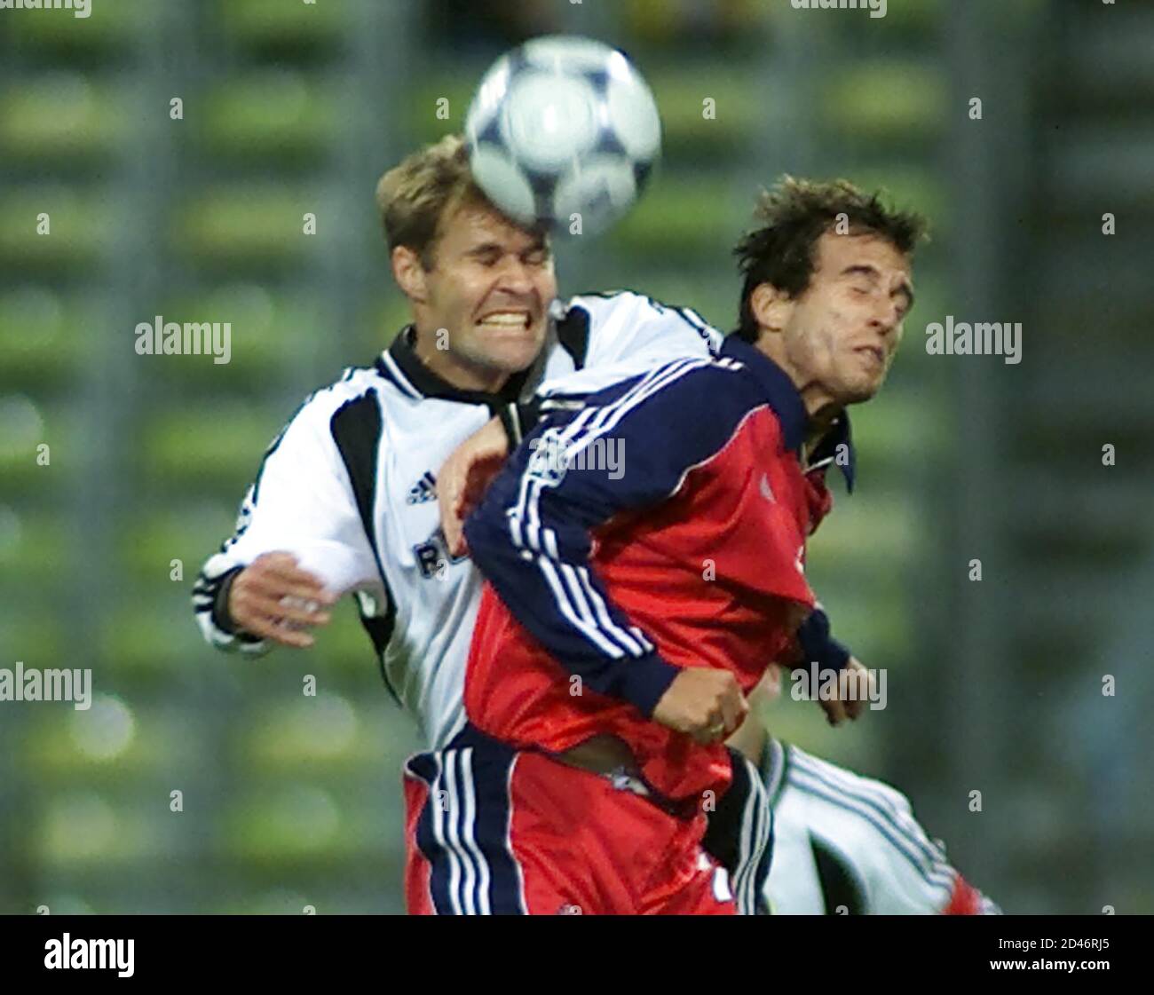 Mehmet Scholl (R) of German first division soccer club FC Bayern Munich  challenges Bent Skammelsrud of Rosenborg Trondheim during the first minutes  of their Champions league soccer match in Munich's olympic stadium,