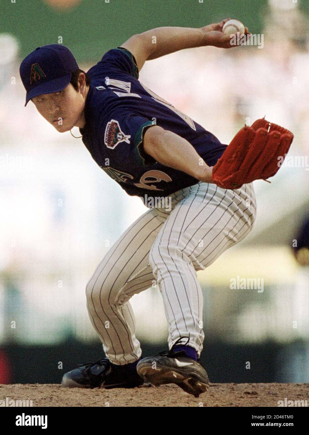 Arizona Diamondbacks relief pitcher ByungHyun Kim of Korea pitches against the St. Louis