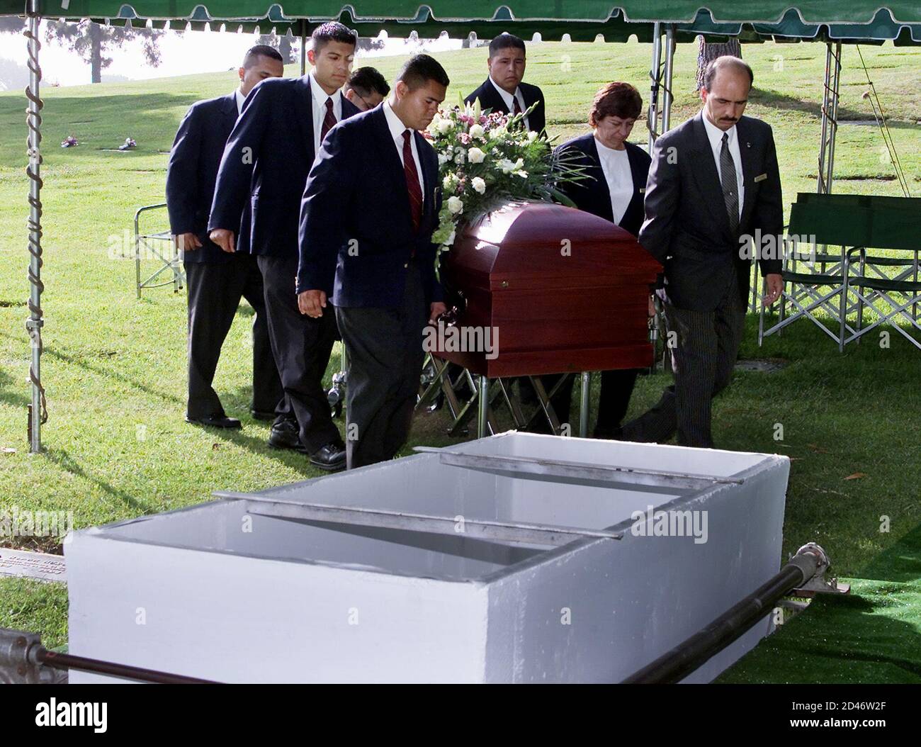 A coffin bearing the body of Bonny Lee Bakley, the slain wife of actor  Robert Blake, is carried by unidentified pallbearers during a brief funeral  ceremony in Los Angeles, May 25, 2001.