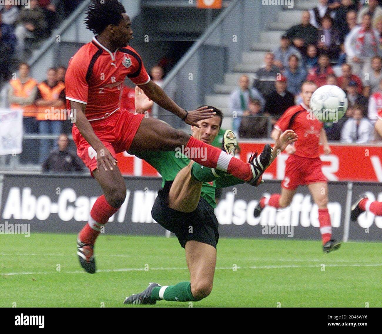 Jacob Lekcetho (L) of Lokomotiv Moskau and Radoslav Gilewicz of FC Tirol  Innsbruck fight for the ball during their replay or the Champions League  third qualification round second leg match in Innsbruck