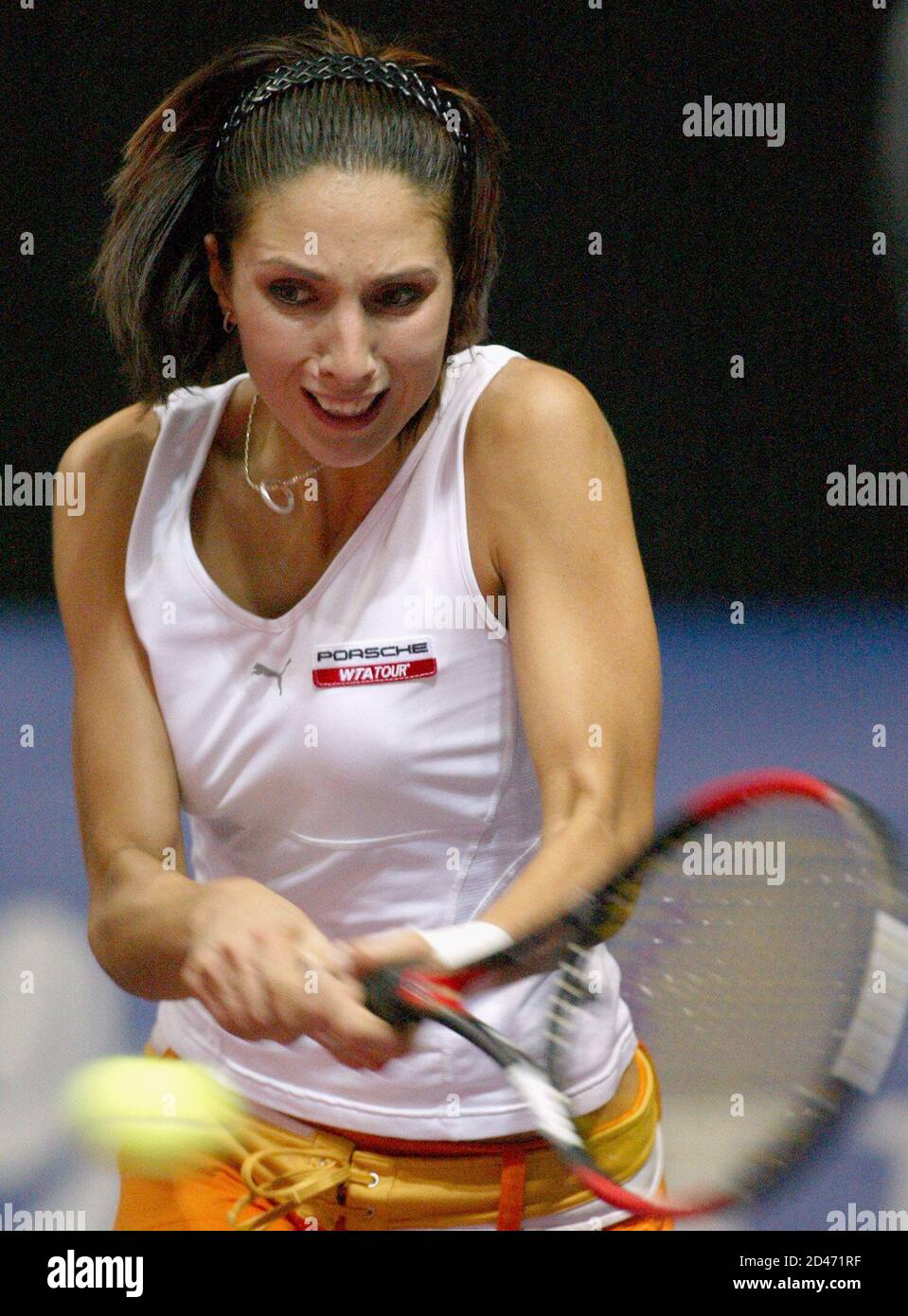 Anastasia Myskina of Russia returns the ball to Karolina Sprem of Croatia  during their Federation Cup World Group first round match in Moscow April  26, 2003. Myskina won the match 6-1 3-6
