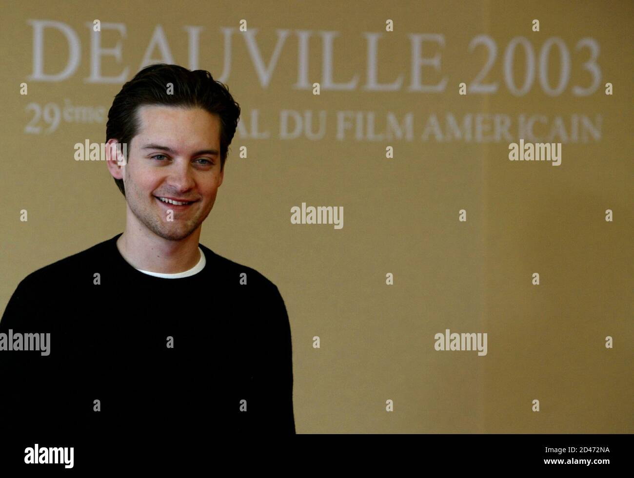 American actor Tobey Maguire poses during a photocall at the American film  festival in Deauville western France, September 6, 2003. Maguire is in  Deauville for the screening of [Gary Ross]film "Seabiscuit Stock