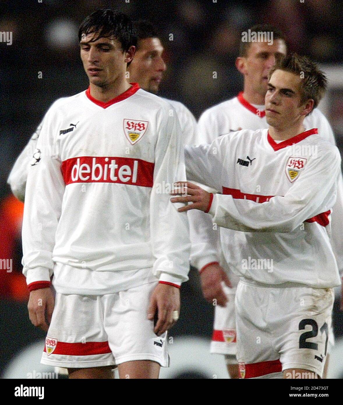 Stuttgart S Fernando Meira Is Comforted By Philipp Lahm Following Champions League Knockout Match Against Chelsea In Stuttgart Stuttgart S Fernando Meira L Is Comforted By Philipp Lahm Following The Champions League First Knockout