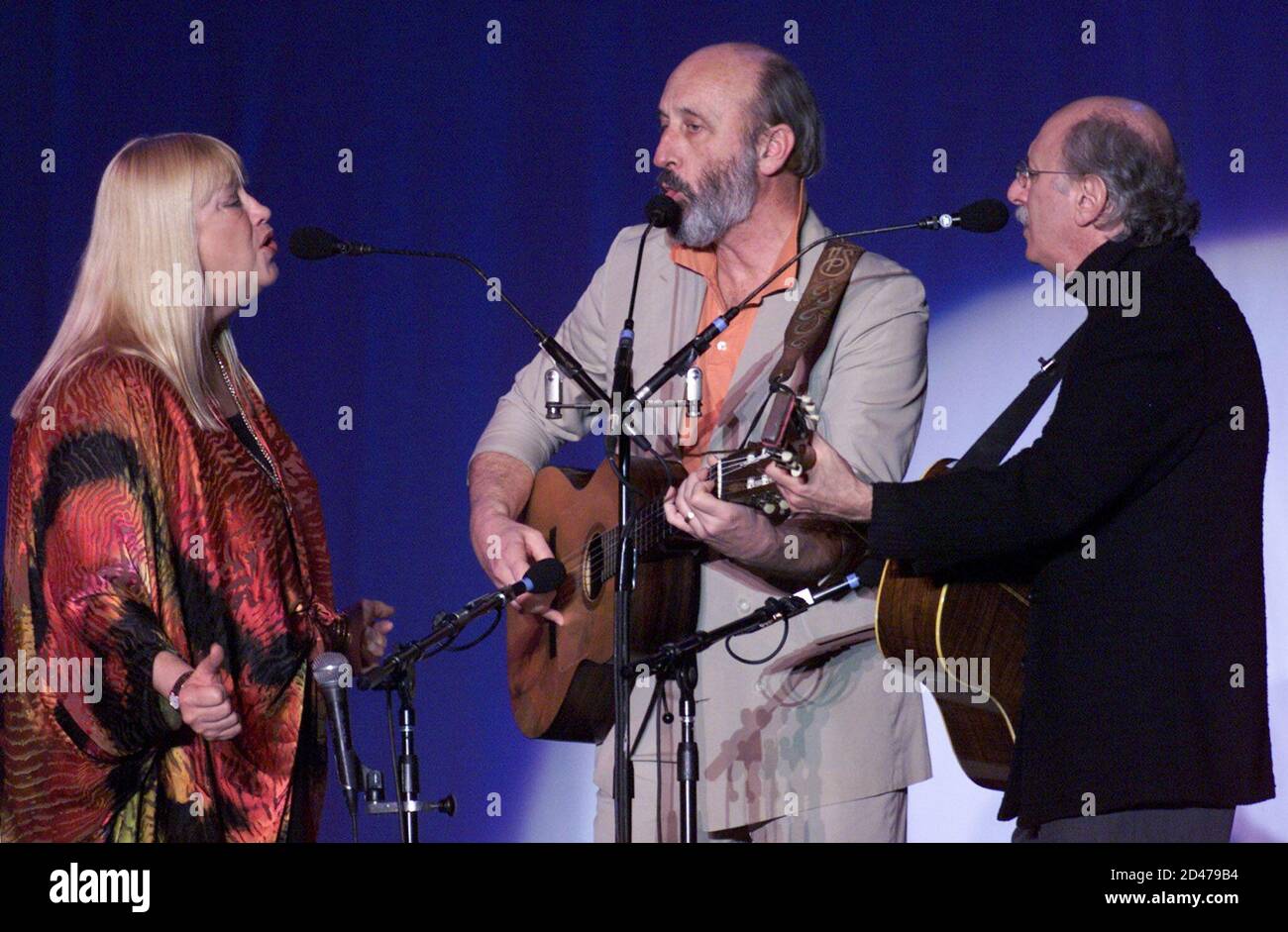 Legendary American folk music pioneeers Peter, Paul & Mary perform during their frist concert in Hong Kong late March 9, 2001. The group is composed of Mary Travers (L), Noel Paul Stookey (C) and Peter Yarrow. KC/JD Stock Photo