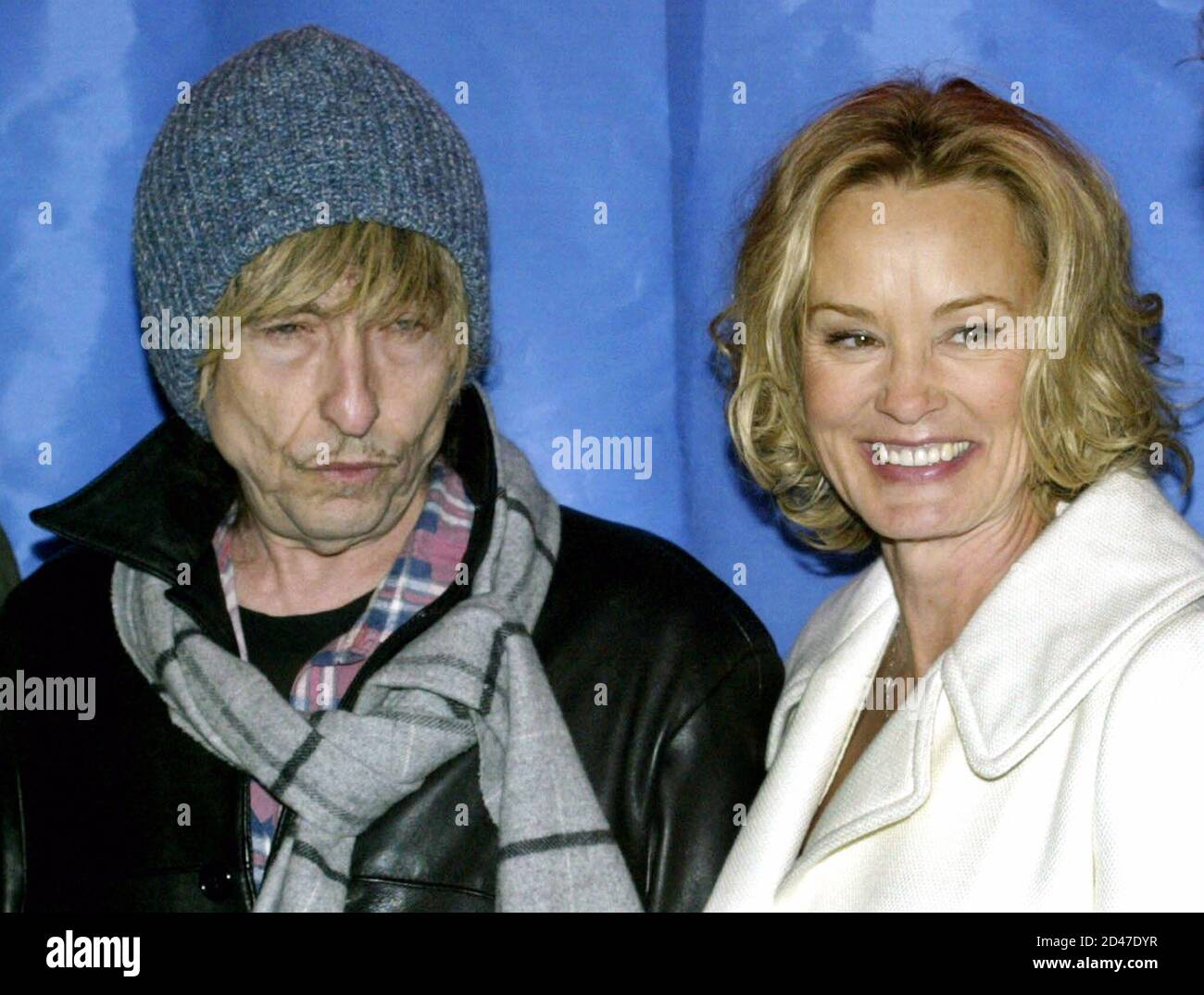 Singer Bob Dylan and actress Jessica Lange, cast members of the film "Masked  and Anonymous," pose during a photo call for the film in Park City, Utah,  January 22, 2003 at the