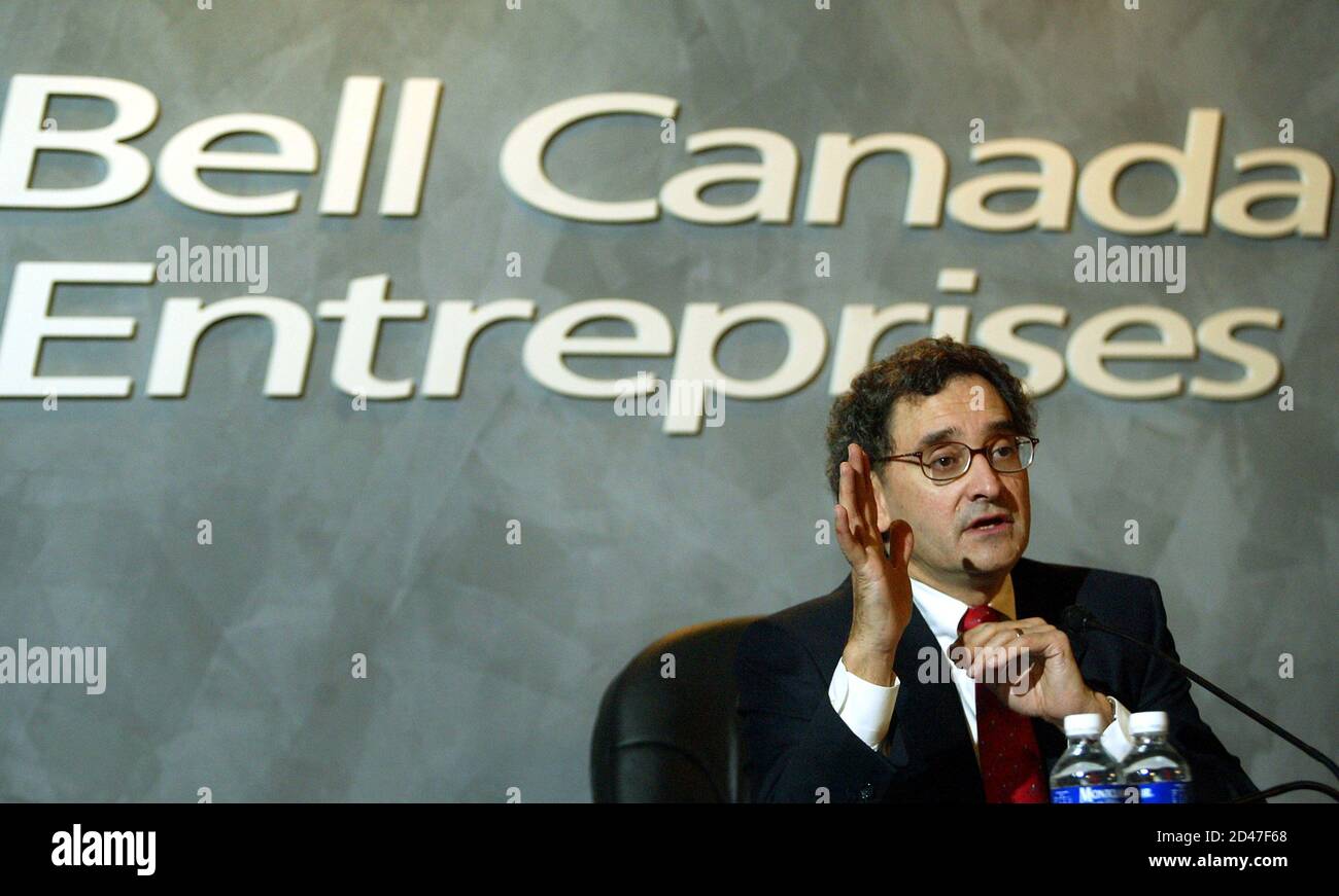 Bell Canada Enterprises' President and Chief Executive Officer, Michael Sabia gestures during a press conference held after BCE's Annual Meeting of the Shareholders in Montreal on May 28, 2003. BCE, Canada's largest telecommunications group, stated it would streamline its Bell Canada unit into three customer-focused units, but does not expect the changes to involve major job cuts or affect its earnings outlook for the current year. REUTERS/Christinne Muschi CM Stock Photo