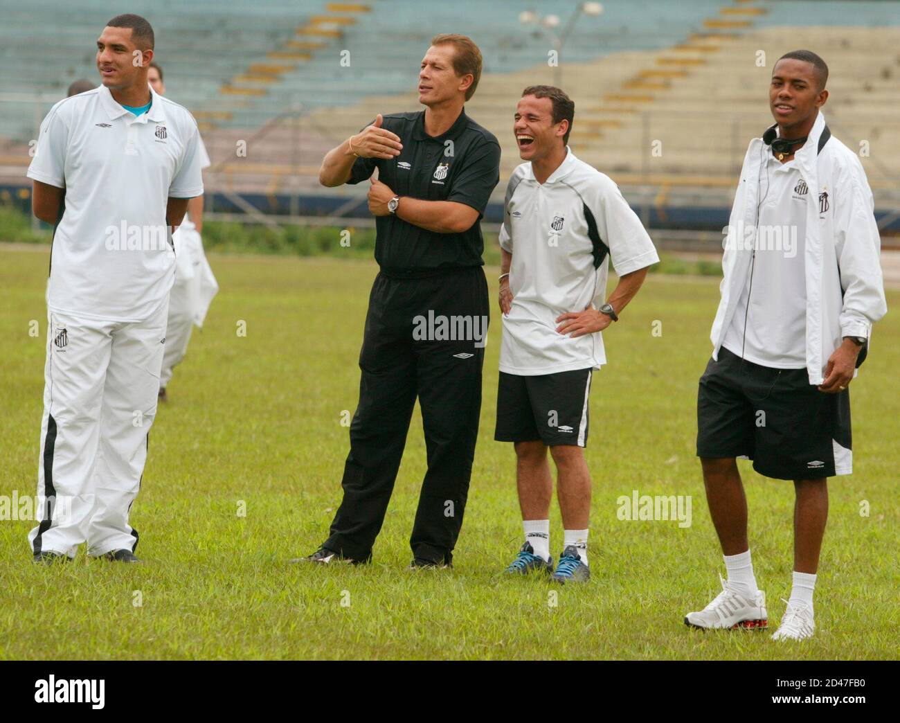 Brazilian Coach Emerson Leao 3r Jokes With His Players Fabio Costa L Leonardo Bastos And Robson De Souza Robinho R During Practice At Atanasio Girardot Stadium June 17 03 Santos Of Brazil Brazilian Coach Emerson Leao 3r Jokes With His Players Fabio Costa L Leonardo Bastos And Robson De Souza Robinho R During Practice At Atanasio Girardot Stadium June 17 03 Santos Of Brazil