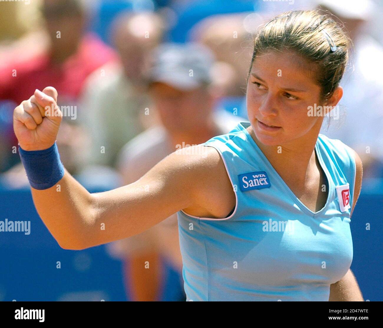 Jelena Kostanic of Croatia reacts after she won a point during her Fed Cup  quarter final match against Barbara Schwartz of Austria in Poertschach on  July 21, 2002. Kostanic lost the match