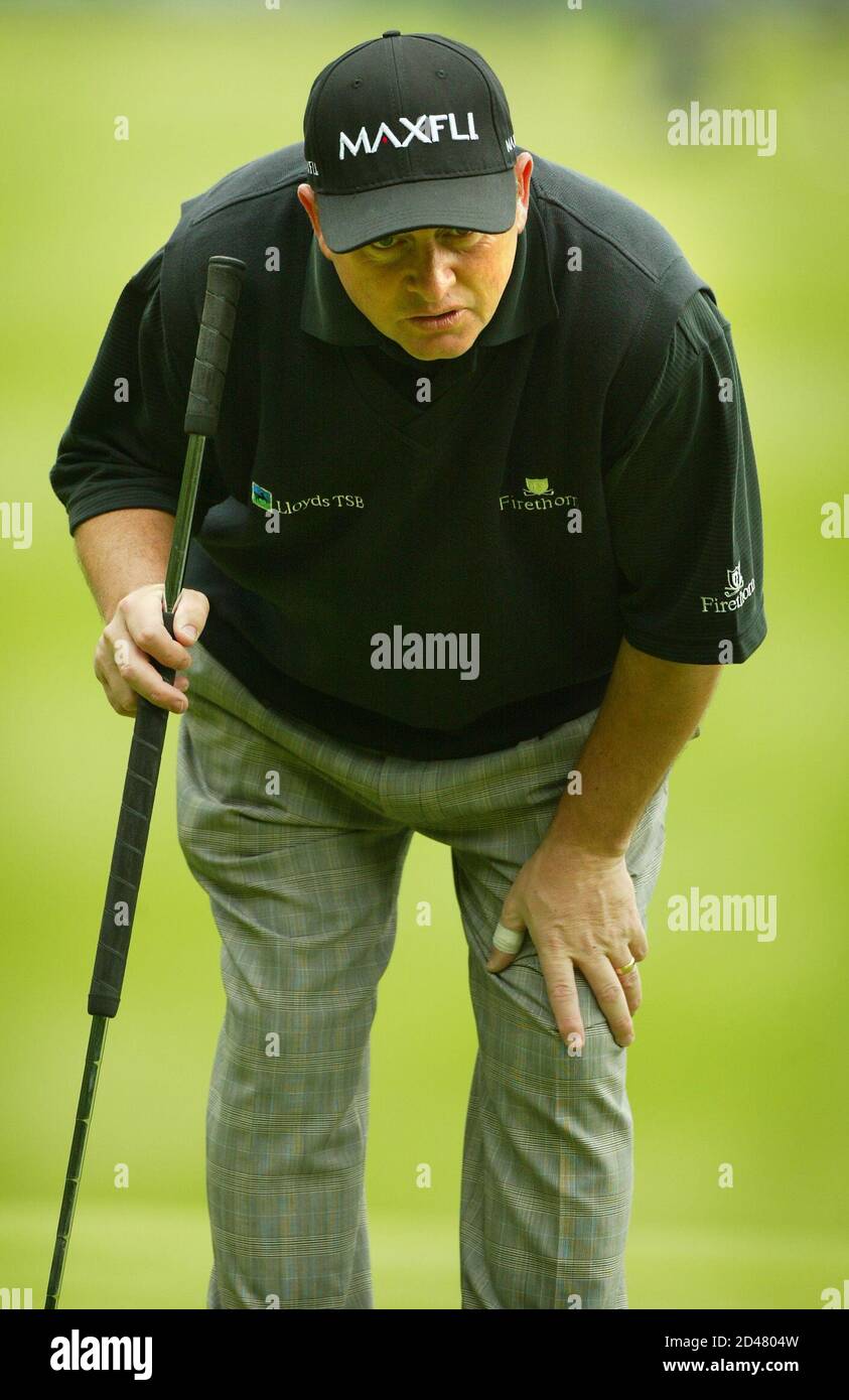 Britain's Ian Woosnam prepares to putt on the first green in the opening round of the PGA Golf Championships at Wentworth, May 22, 2003. REUTERS/Peter Macdiarmid  PKM/MD/WS Stock Photo