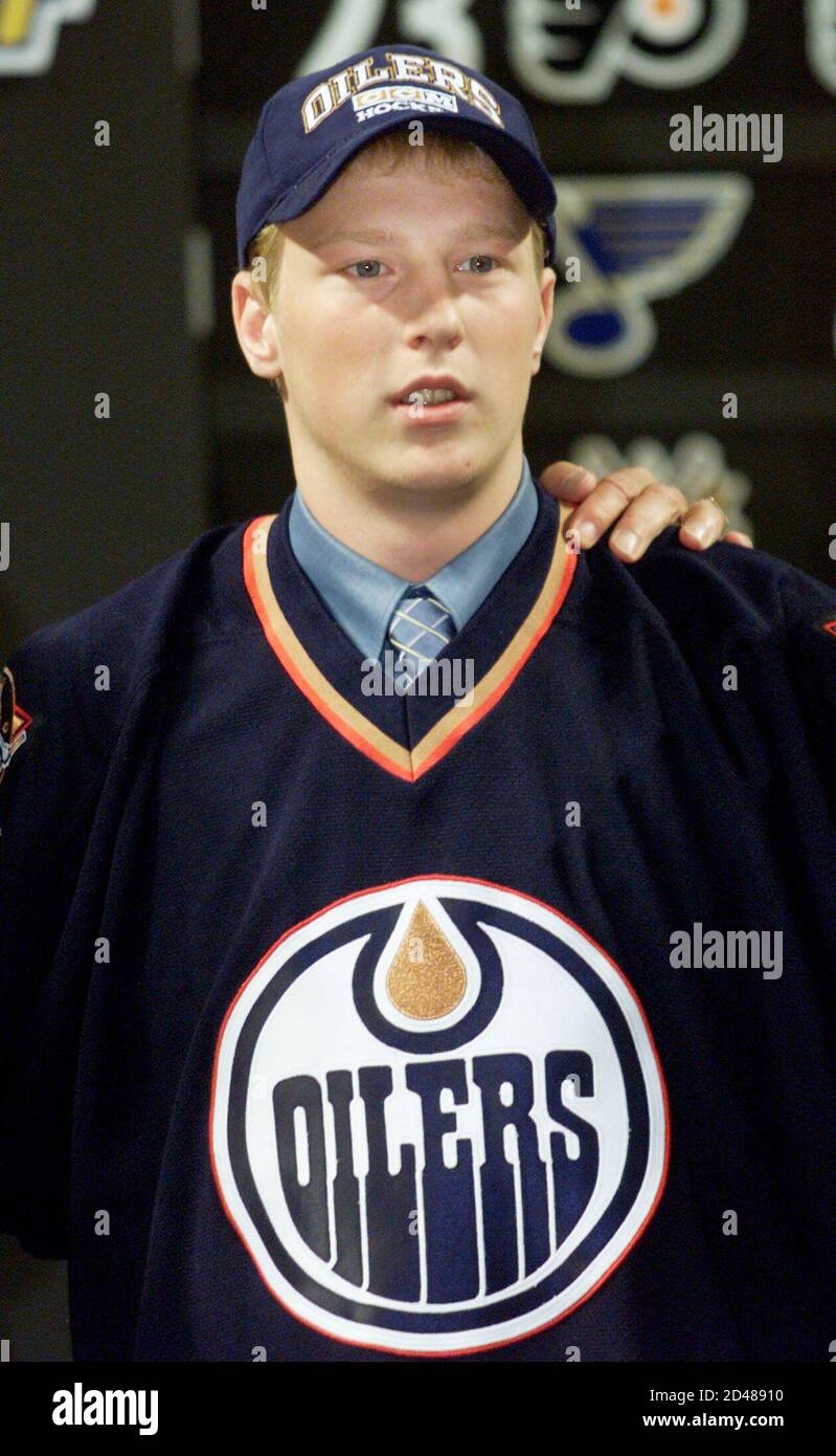 Ales Hemsky of Pardubice, Czech Republic, wears his new Edmonton Oilers  jersey after the team chose him as the thirteenth pick in the first round  of the National Hockey League 2001 Entry
