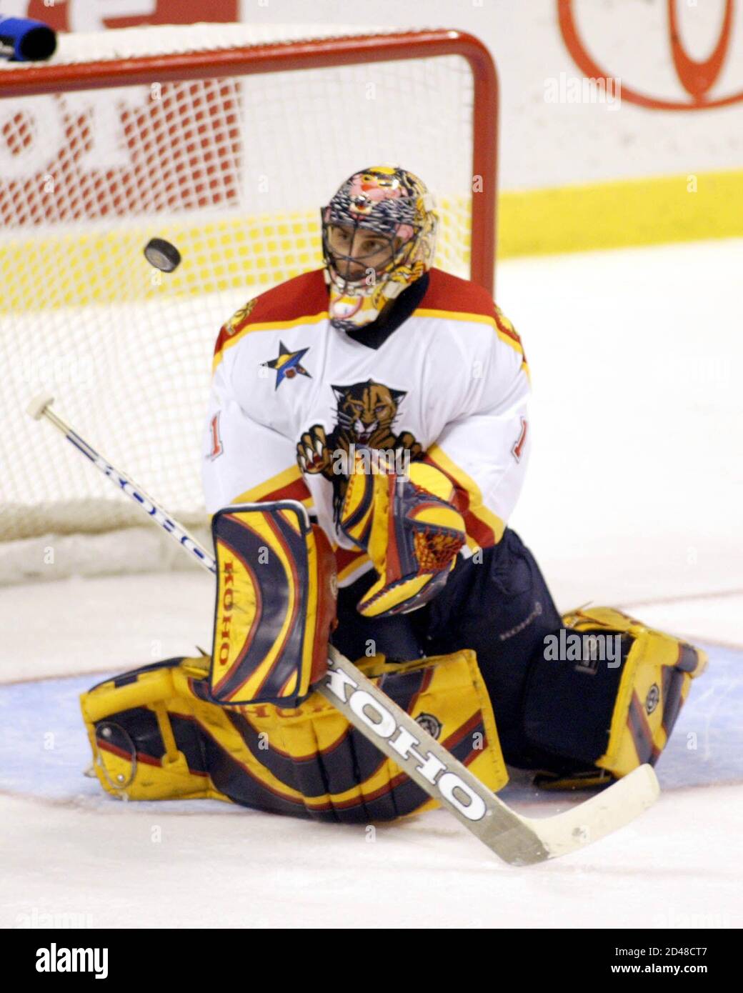 Florida Panthers goalie Roberto Luongo makes a save against the Montreal  Canadians in the second period of NHL action at the Office Depot Center in  Sunrise, Florida, January 20, 2003. REUTERS/Marc Serota