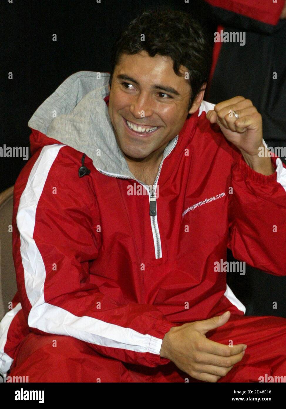 WBC/WBA super welterweight champion Oscar De La Hoya acknowledges cheers from the audience as he waits to weigh-in at the Mandalay Bay Events Center in Las Vegas, Nevada, May 2, 2003. De La Hoya (35-2) of Los Angeles, defends his title against Yory Boy Campas (80-5) of Navajoa, Mexico at the events center on May 3. De La Hoya weighed the limit of 154 lbs. Campas weighed 153.5 lbs. REUTERS/Steve Marcus  SM Stock Photo