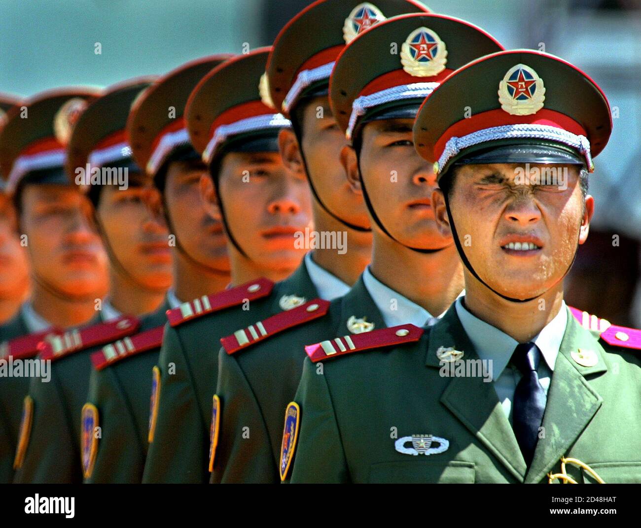 Soldiers of the People's Liberation Army of China (PLA) line up before  parade in Hong Kong, August 1, 2004. Today marked the 77th anniversary of  the PLA which won control of mainland