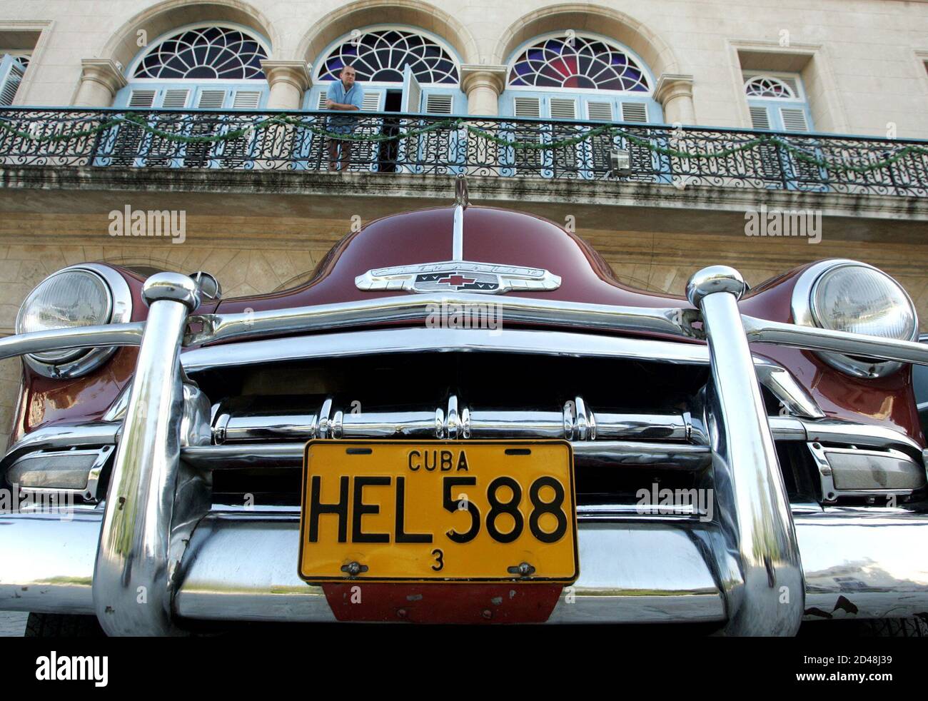 A U S Chevrolet Antique Car Is Parked Underneath A Hotel In Old Havana November 16 2004 Thousands Of American Automobiles Circulate Through Cuban Streets Every Day Turning The Island Into The Greatest