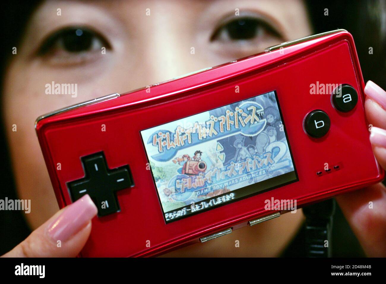 Nintendo Ltd unveils the Game Micro handheld in Tokyo June 7, 2005. The 2.8-ounce Micro handheld is the of a cellphone, and will play all the same games