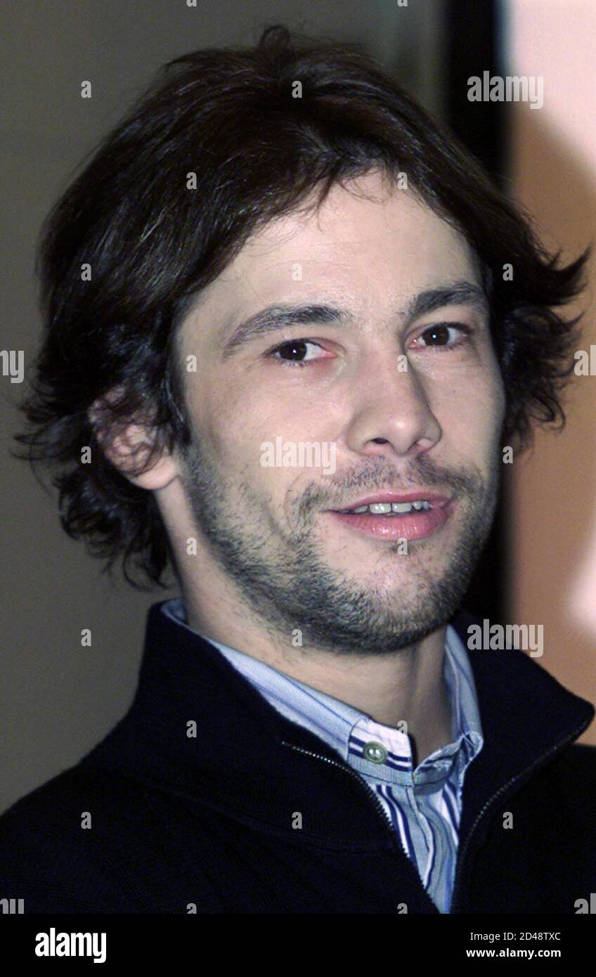 Vocalist for the British music group Jamiroquai, Jay Kay, poses for photographers during a news conference in Hong Kong January 20, 2002 to promote their latest album 'A Funk Odyssey'. Stock Photo