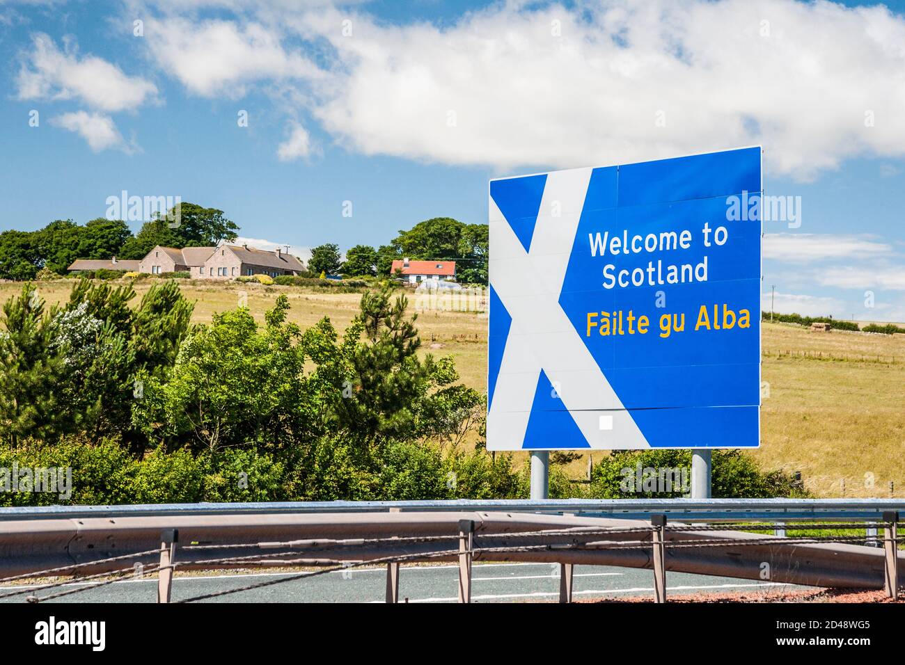Road sign on the A1 at the border between Scotland and England near Berwick-upon-Tweed. Stock Photo