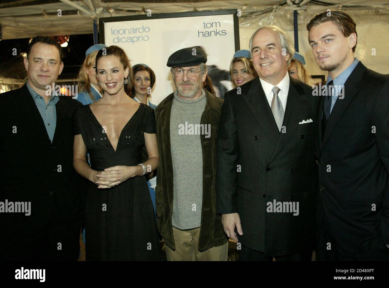 Actors Tom Hanks (L) and Leonardo DiCaprio (R) join others from the film "Catch  Me If You Can" at a special screening December 16, 2002 in Los Angeles.  From left are Hanks,
