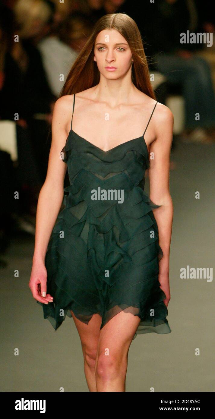 A model wears a chiffon short dress at the Calvin Klein Fall 2003  Collection show in New York, February 14, 2003. REUTERS/Jeff Christensen JC  Stock Photo - Alamy