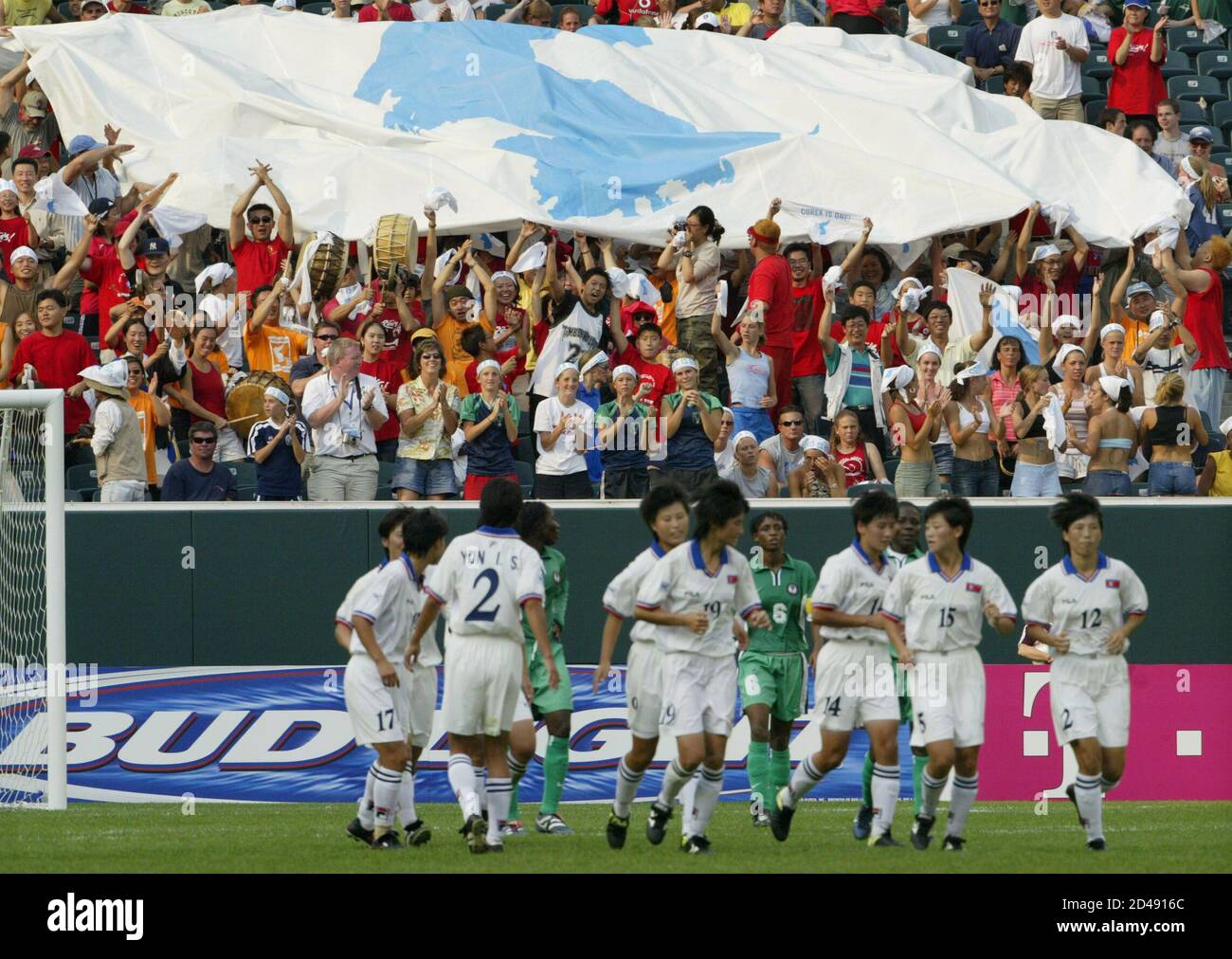 Members Of The North Korean Soccer Team Run Down The Field After Jin Pyol Hui Hidden Scored Her Team S 3rd Goal Against Nigeria During Second Half Action In Their First Round Fifa