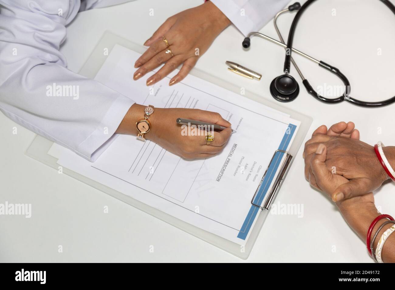Indian doctor with female patient hi-res stock photography and images ...