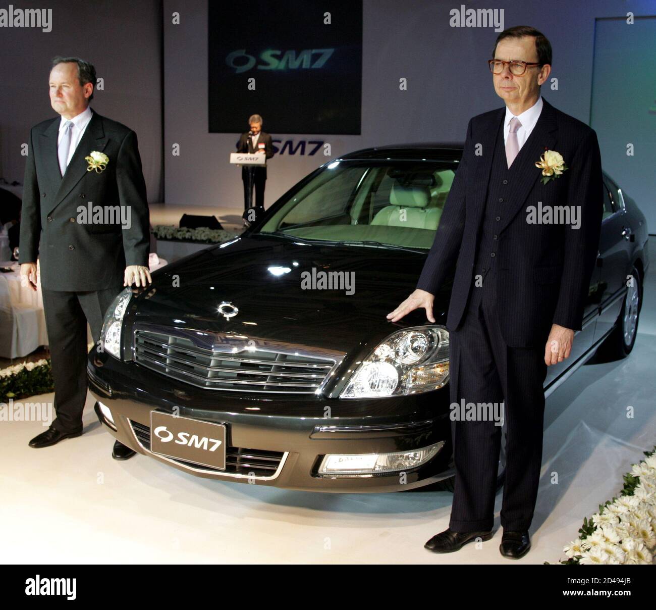 Louis Schweitzer R Chairman Of French Carmaker Renault Poses With Renault Samsung Motors President Jerome Stoll L At An Unveiling Ceremony For Renault Samsung S First Large Sedan The Sm7 In Seoul November