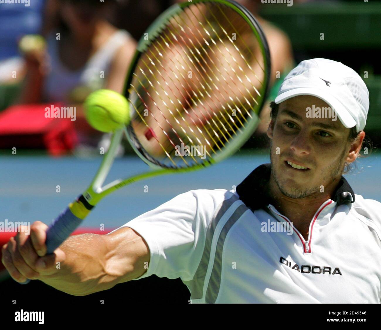 Gaston Gaudio From Argentina Hits A Backhand During His Match Against Compatriot David Nalbandian At The Kooyong Classic Tennis Tournament In Melbourne Gaston Gaudio From Argentina Hits A Backhand During His Match