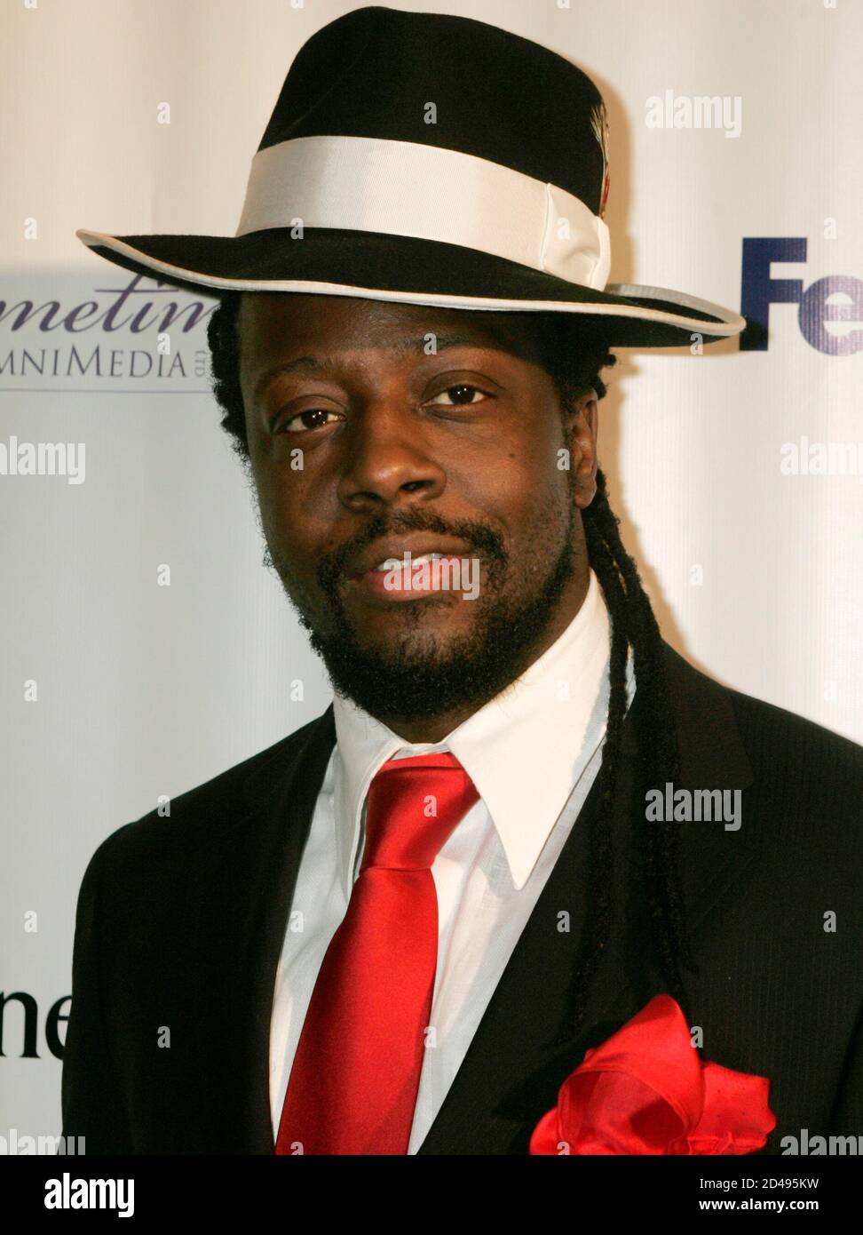 Haitian-American hip-hop artist Wyclef Jean poses for photographers at the  Ebony Magazine party in Beverly Hills, California February 24, 2005.  REUTERS/Fred Prouser SN/JJ Stock Photo - Alamy