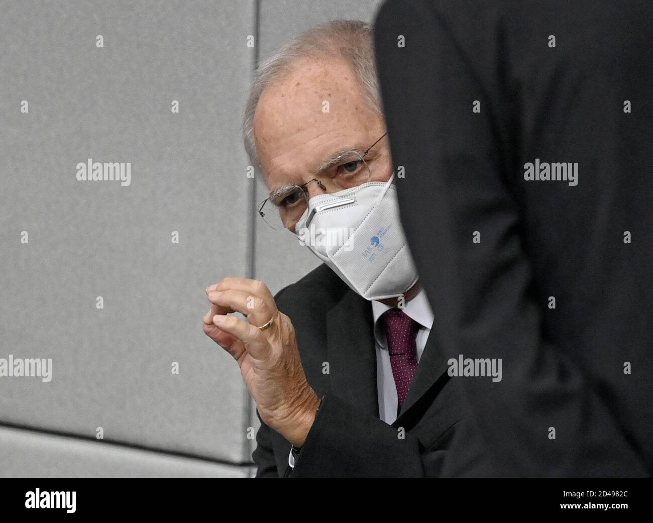 Berlin, Germany. 09th Oct, 2020. Wolfgang Schäuble (CDU), President of the Bundestag, gestures at the session of the Bundestag with mouth and nose protection. The victims of the German wars of annihilation are being debated, as is the vote on the reform of family reunification in the EU. Credit: Britta Pedersen/dpa-Zentralbild/dpa/Alamy Live News Stock Photo