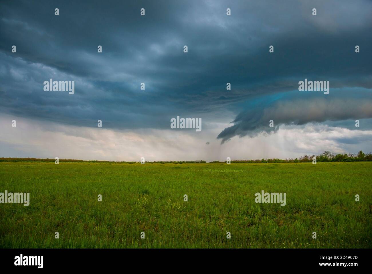 Spring landscape with a stormy sky Stock Photo - Alamy