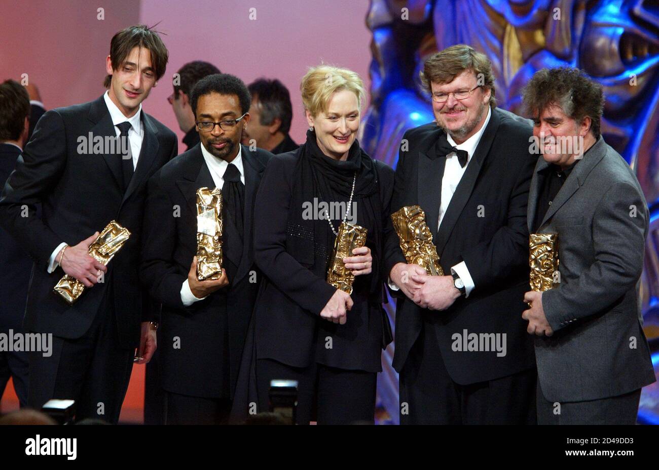 Left to right: U.S. actor Adrien Brody, U.S. director Spike Lee, U.S.  actress Meryl Streep, U.S. director Michael Moore and Spanish director  Pedro Almodovar pose together at the end of the French