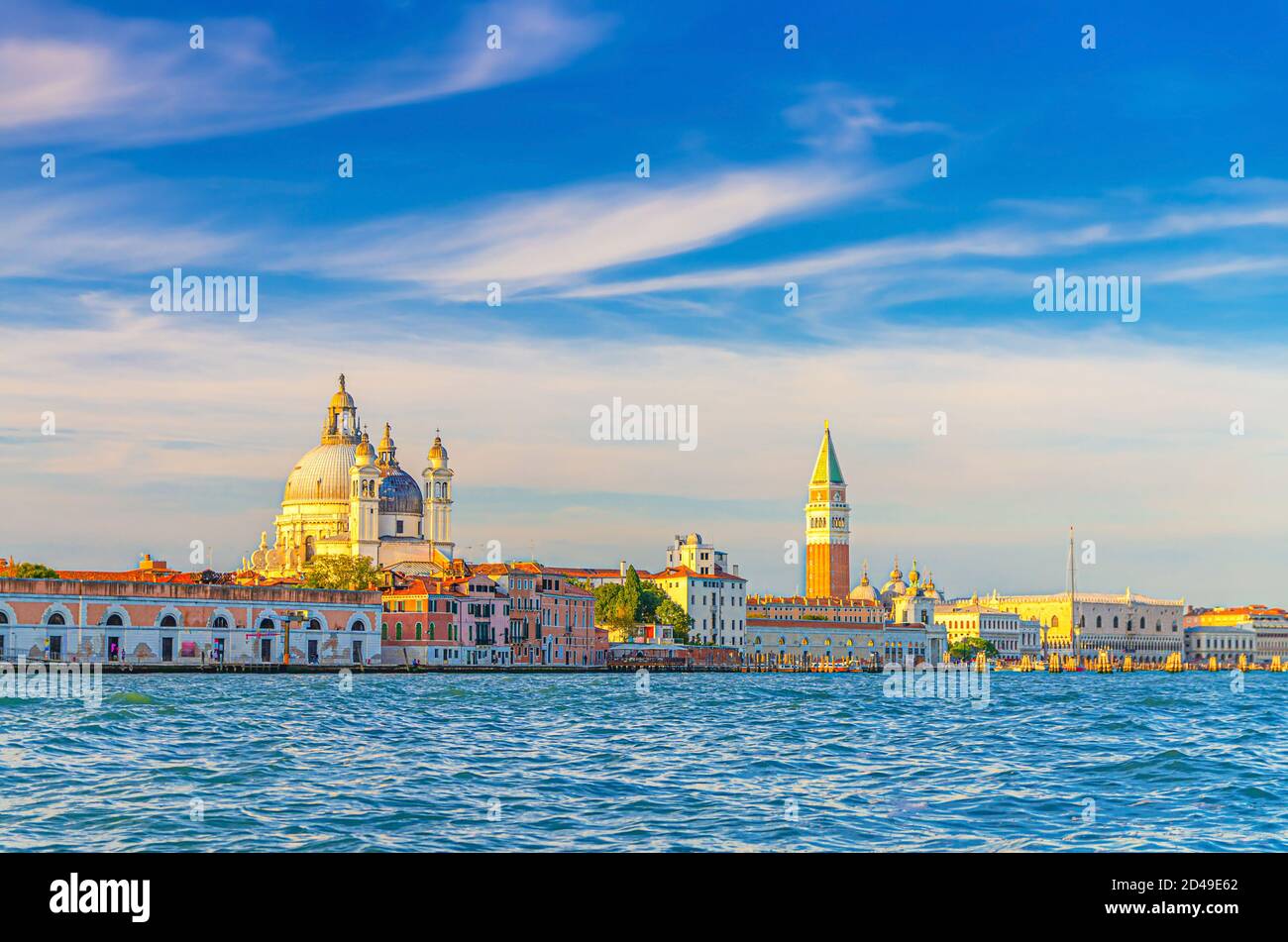 Venice cityscape with San Marco basin of Venetian lagoon water, Santa Maria della Salute church, Campanile bell tower and Doge's Palace Palazzo Ducale building, Veneto Region, Italy Stock Photo