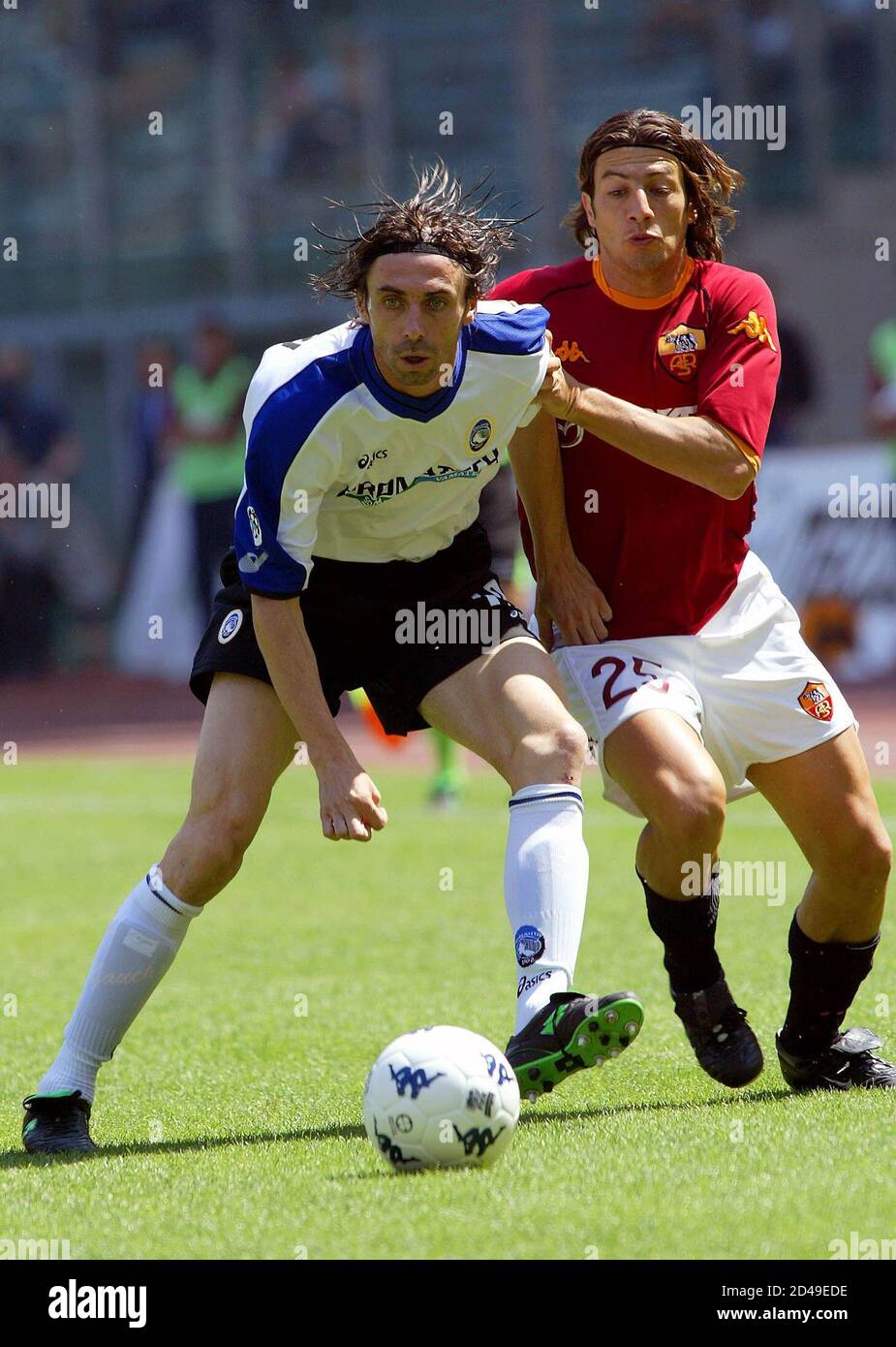As Roma S Gianni Guigou Challenges Carmine Gautieri Of Atalanta Front During Their Serie A Match At The Olympic Stadium In Rome May 24 2003 Reuters Giampiero Sposito Gs Sn Stock Photo Alamy